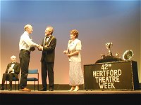 Mayor Alan White presents the Stage Presentation award to director Barry Lee